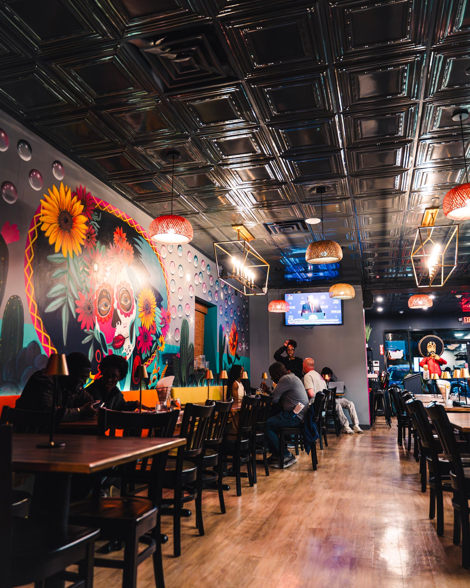 Booth seating with warm pendant lighting